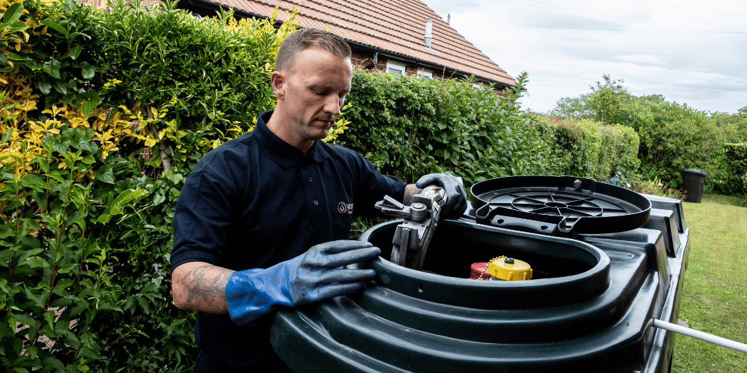 Man Refilling Oil Tank 4