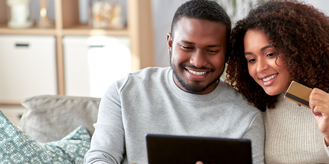 Couple Looking at Tablet